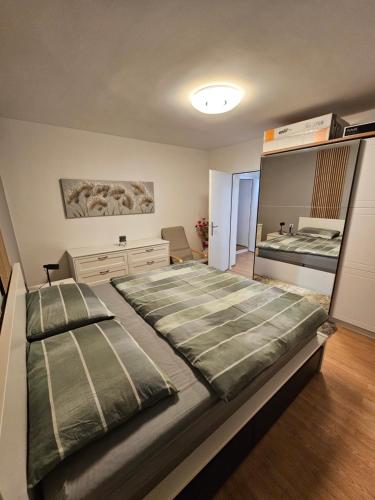 Postel nebo postele na pokoji v ubytování Apartman Cresnar