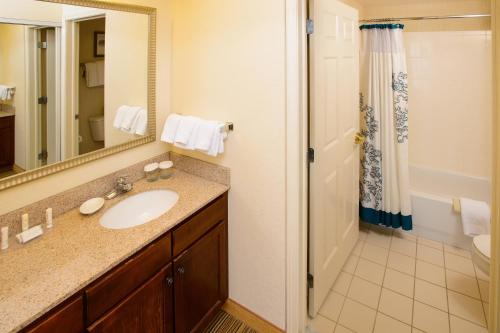 a bathroom with a sink and a shower at Residence Inn Rochester Mayo Clinic Area in Rochester