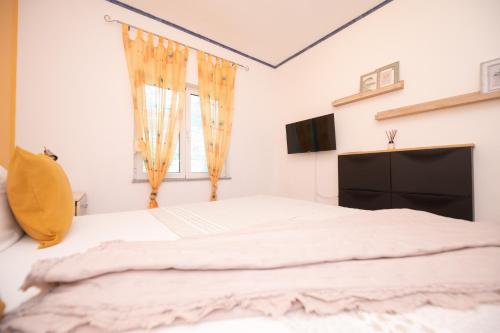 Ένα ή περισσότερα κρεβάτια σε δωμάτιο στο Sea View Apartment Ana