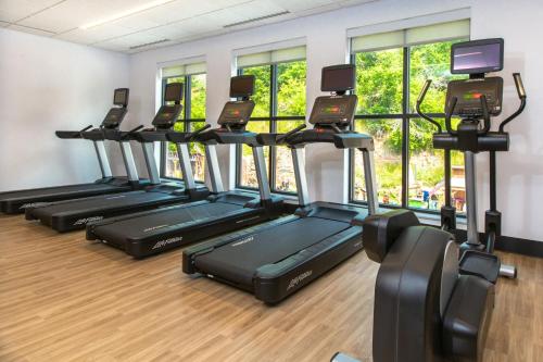a row of treadles in a gym with windows at Four Points by Sheraton Deadwood in Deadwood