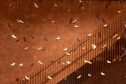 a reflection of a wall with a bunch of surfboards at AC Hotel by Marriott Wuerzburg in Würzburg