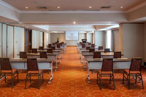 a row of tables and chairs in a room at Sheraton Lima Historic Center in Lima