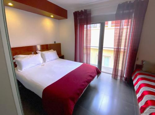 Hotel Oceanoにあるベッド