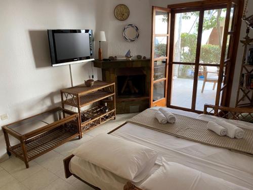 Postel nebo postele na pokoji v ubytování Melon Apartment