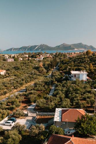 an aerial view of a town with trees and the water at Elais House Methoni in Methoni
