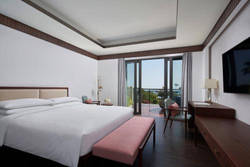 Ένα ή περισσότερα κρεβάτια σε δωμάτιο στο Sanya Marriott Yalong Bay Resort & Spa