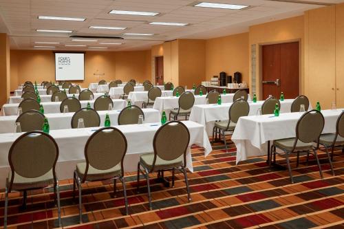 a conference room with white tables and chairs at Four Points by Sheraton Halifax in Halifax