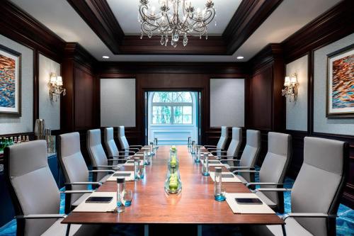 a conference room with a long table and chairs at The Ritz-Carlton, Sarasota in Sarasota
