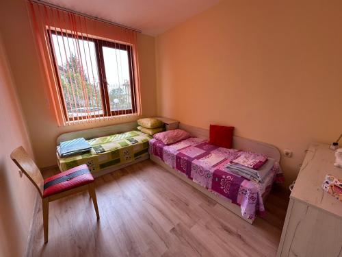 Ένα ή περισσότερα κρεβάτια σε δωμάτιο στο Apartments in complex Albena hills
