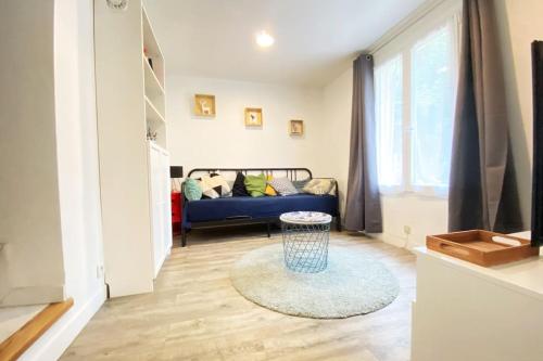 Postel nebo postele na pokoji v ubytování Maison avec jardin et jacuzzi proche Polytechnique