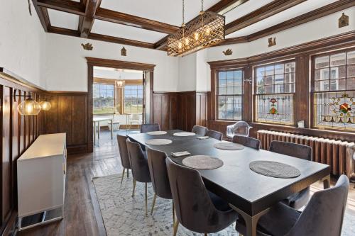 a conference room with a table and chairs at Grand Historic 8BR 6 5BA Mansion Waterfront Decks in Atlantic City