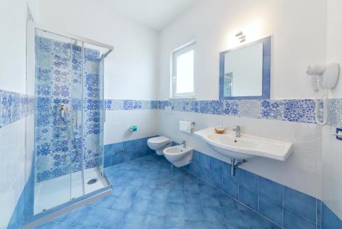 Ένα μπάνιο στο Hotel Oasi Castiglione