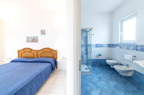 Ένα μπάνιο στο Hotel Oasi Castiglione