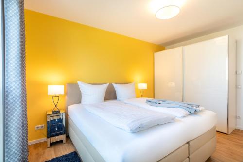 Ένα ή περισσότερα κρεβάτια σε δωμάτιο στο Apartment "Wikinger Exklusiv" - Haffresidenz