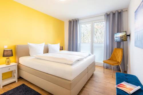 Ένα ή περισσότερα κρεβάτια σε δωμάτιο στο Apartment "Wikinger Exklusiv" - Haffresidenz