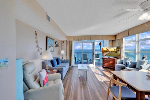 a living room with a view of the ocean at Carolinian Corner Gem Views! in Myrtle Beach