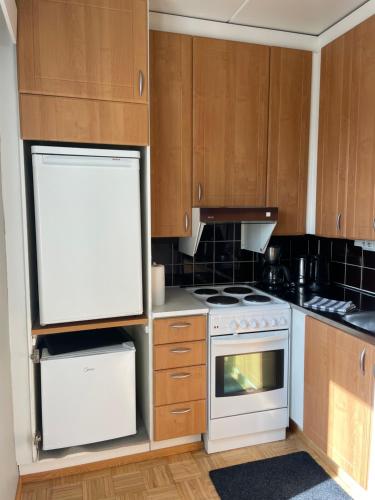 Köök või kööginurk majutusasutuses Tapiola City Apartment