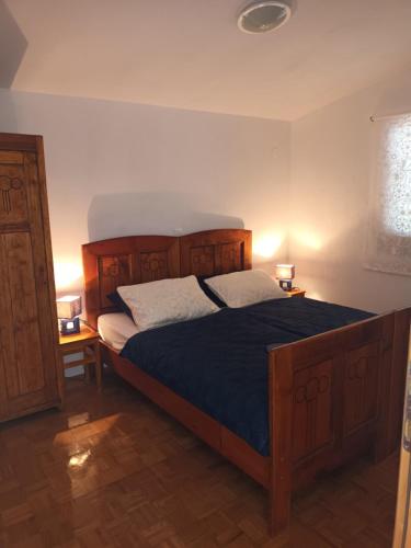 Katil atau katil-katil dalam bilik di Apartmani Šikić Metajna