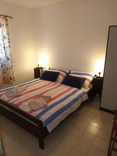 Katil atau katil-katil dalam bilik di Apartmani Šikić Metajna