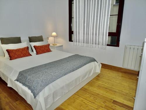 Apartamento con encanto junto a la Plaza Mayor tesisinde bir odada yatak veya yataklar