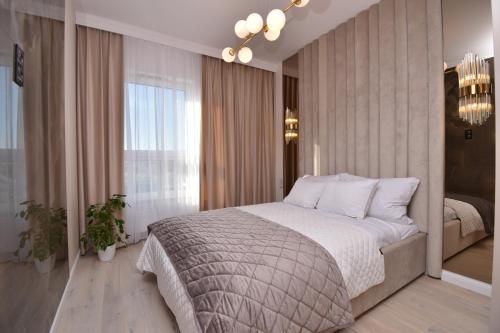 Krevet ili kreveti u jedinici u objektu Nowa Letnica Tower- Premium Apartments