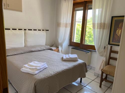 Katil atau katil-katil dalam bilik di Casa della Regina