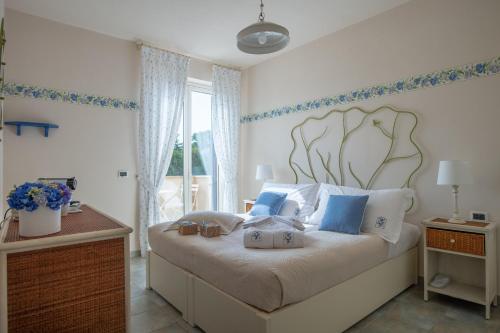 Postel nebo postele na pokoji v ubytování B&B at DurruEli's