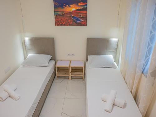 Cama ou camas em um quarto em Doris home