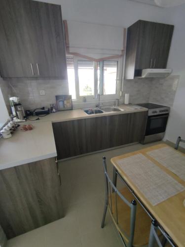 Η κουζίνα ή μικρή κουζίνα στο Kritharia Guesthouse Volos