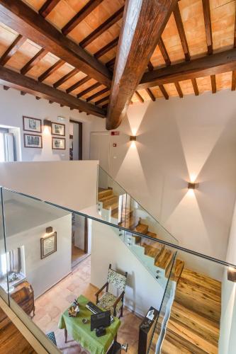 an image of a glass staircase in a house at Agriturismo Colli Martani in Massa Martana