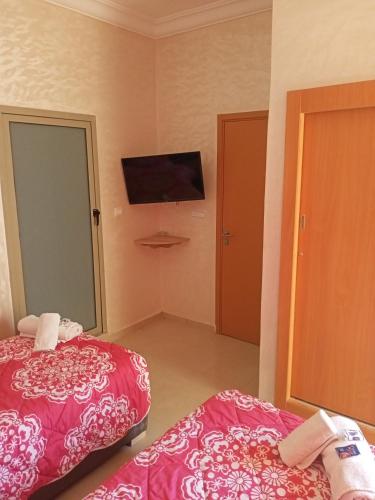 Hotel Tidinitにあるベッド