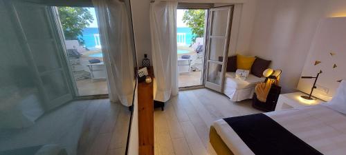 Gallery image of Vrahos Boutique Hotel in Karavostasi