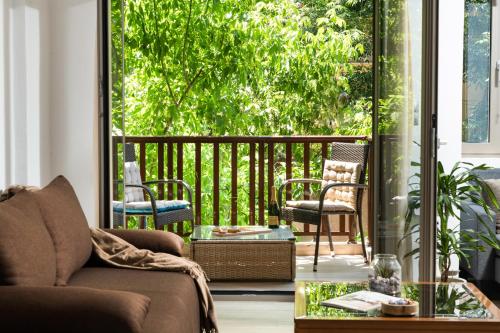 A balcony or terrace at ModernPastel Apartment - Private Parking,Near the Old Port