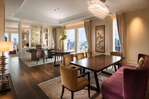 a dining room with a table and chairs at The St. Regis Osaka in Osaka