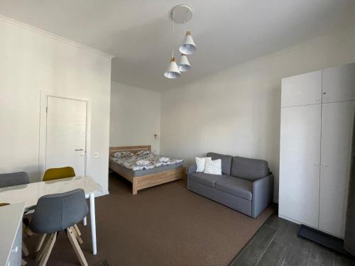 Ένα ή περισσότερα κρεβάτια σε δωμάτιο στο Gloria Apartments