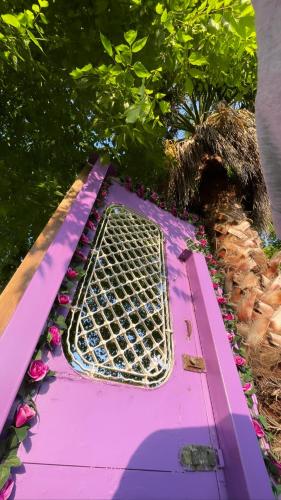 a purple board with a grate on top of it at Mama’s Sunshine Garden Villa in Áyios Ilías