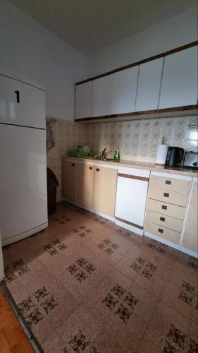 Kuchyň nebo kuchyňský kout v ubytování Guest House Jasmin