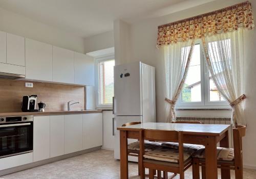 Kuchyň nebo kuchyňský kout v ubytování Lonzan Apartment