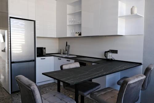 Una cocina o zona de cocina en Board apart hotel