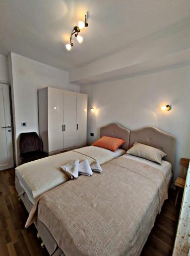 Postel nebo postele na pokoji v ubytování Glušac Lux