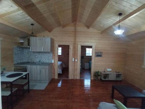 Kuchyň nebo kuchyňský kout v ubytování Casa de madera muy acogedora en una zona tranquila