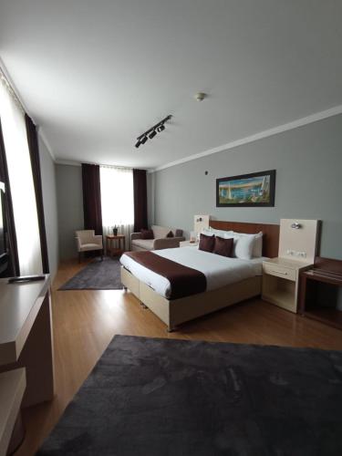 Katil atau katil-katil dalam bilik di Gosterisli Otel