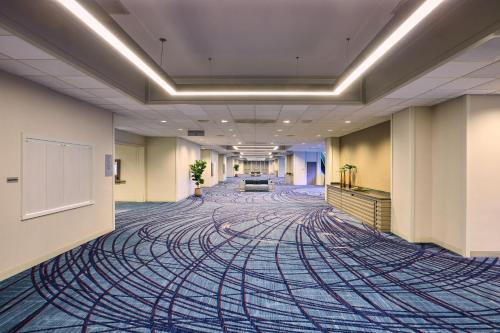 a large room with a large rug on the floor at Los Angeles Airport Marriott in Los Angeles