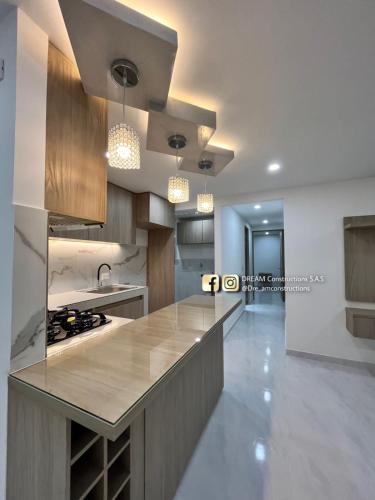 Kuchyň nebo kuchyňský kout v ubytování Loft Moderno con aire , en conjunto Goya con piscina T12