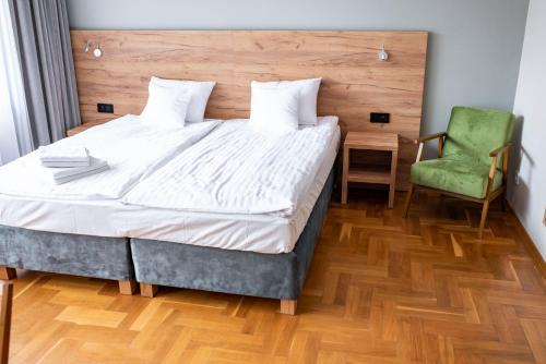 Postel nebo postele na pokoji v ubytování Ohana Space w Juracie