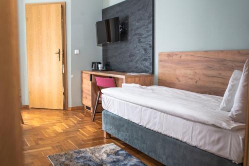 Postel nebo postele na pokoji v ubytování Ohana Space w Juracie