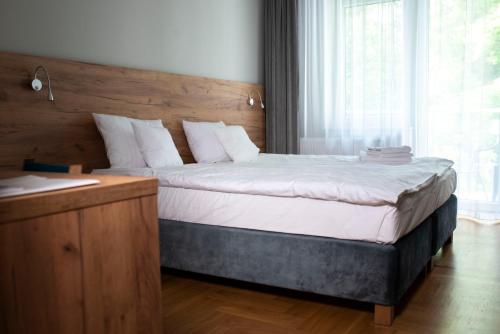 Postel nebo postele na pokoji v ubytování Ohana Space w Juracie