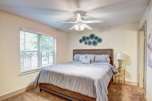 a bedroom with a bed and a ceiling fan at Downtown Atlanta’s hidden gem! in Atlanta