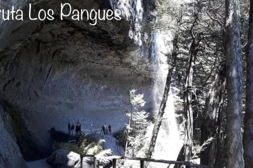 a group of people standing in a snow cave at Departamento Termas de Chillán in Pinto