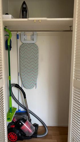 a room with a mop and a mop at Private Guesthouse - Pet friendly - Walk to Beach in Buddina